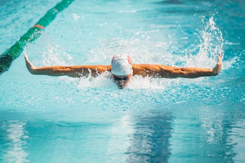 Person Swimming in the Pool