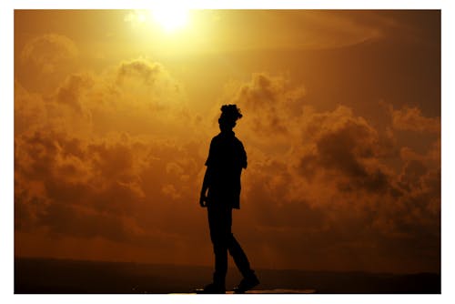 Silhouette of Man During Sunset
