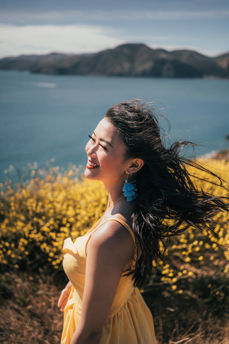 A Beautiful Woman In A Yellow Dress