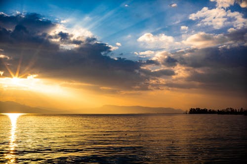 Free stock photo of blue sky, cloudy sky, golden sun