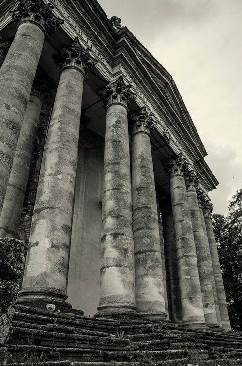 Free Black and white photo capturing Pidhirtsi Castle's ancient columns in Ukraine. Stock Photo