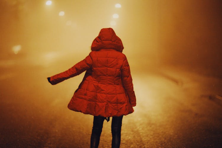 A Person In A Red Puffer Jacket