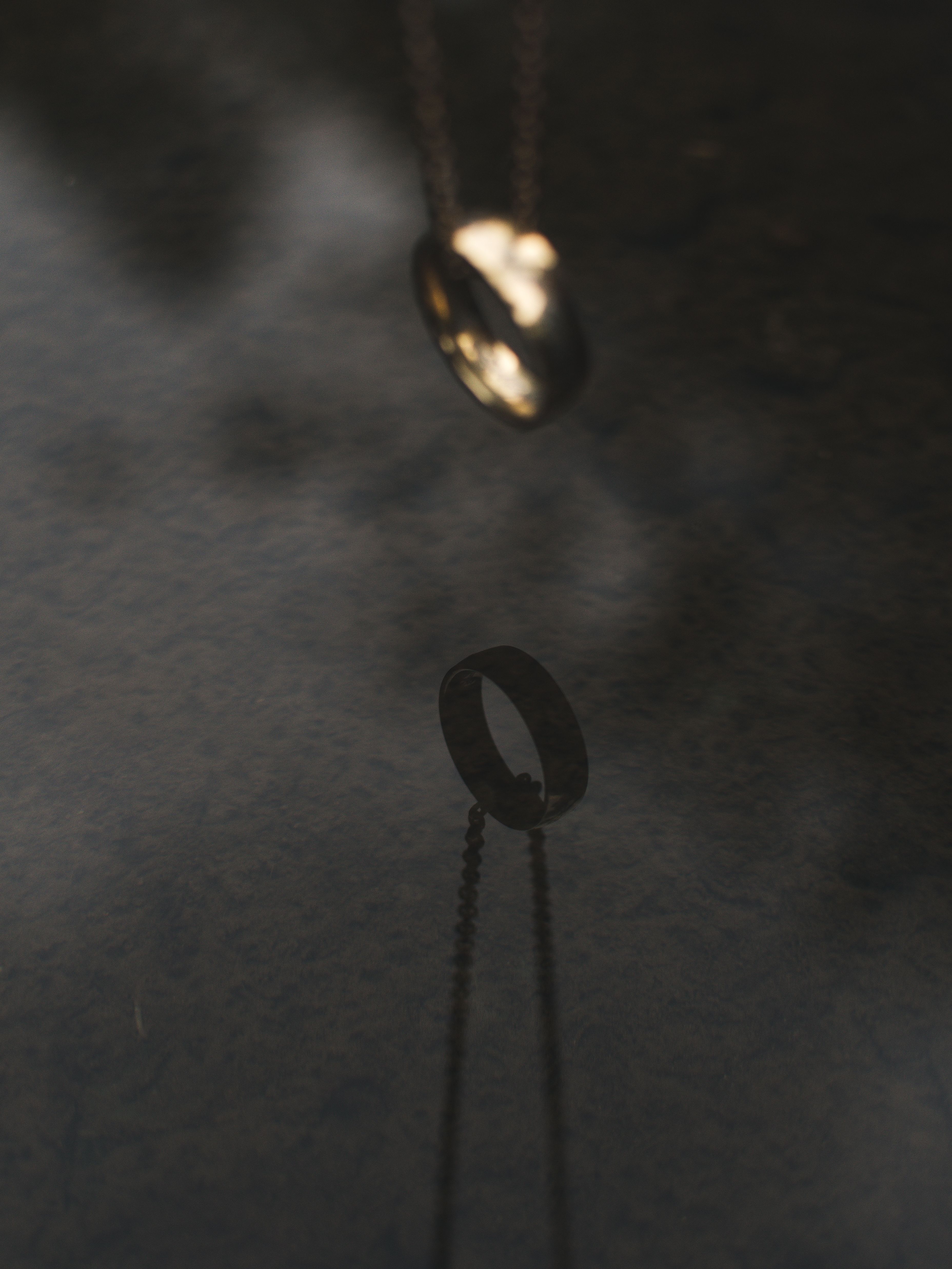 A Reflection of a Ring Used as a Pendant · Free Stock Photo