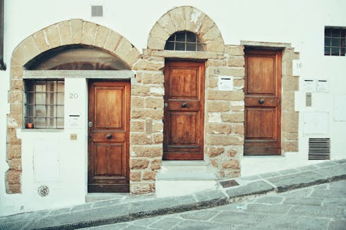 Wooden Doors on Arch Entrance 