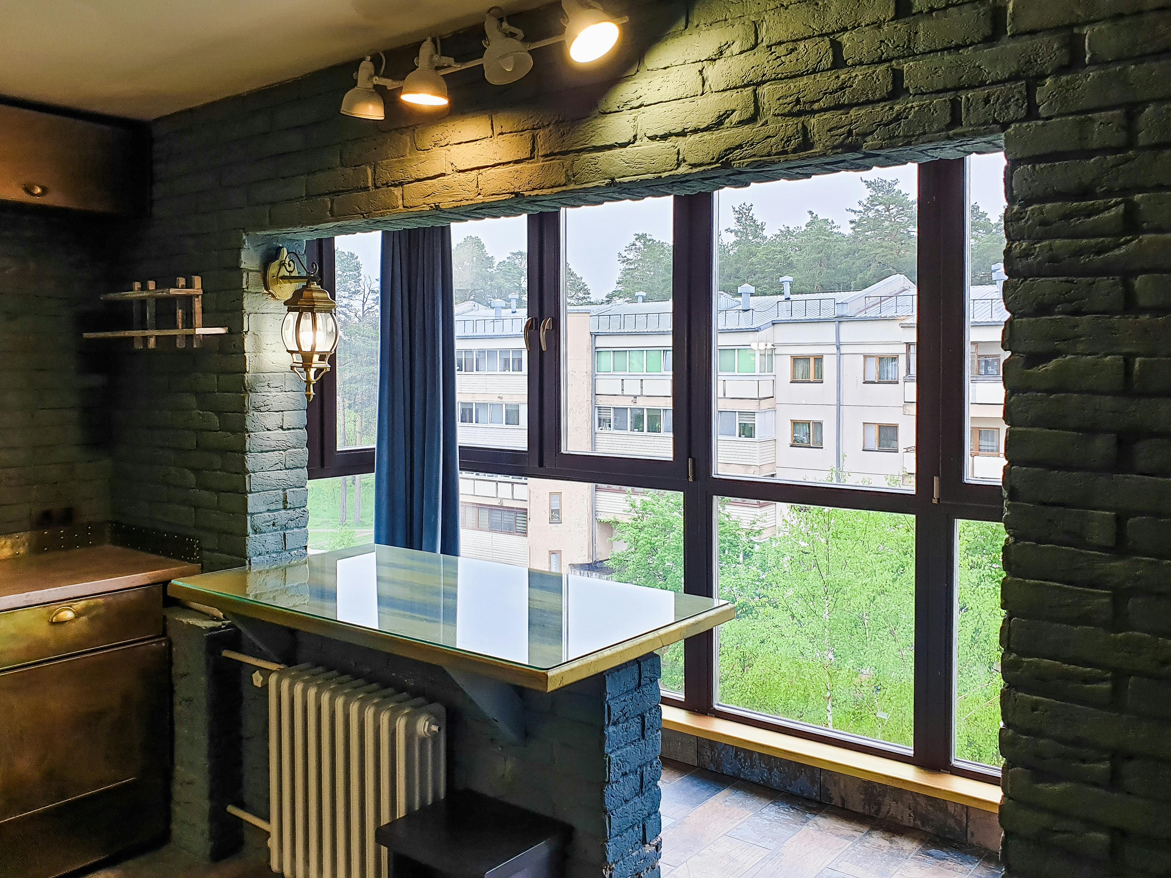 beautifully renovated loft apartment interior with exposed brick and large windows - 2 bedroom apartments in downtown detroit