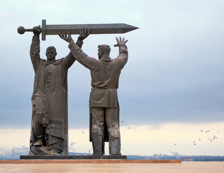 Male Statue Carrying A Sword