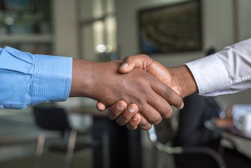 Free Two Person Hand Shaking Stock Photo