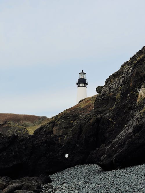 White Lighthouse Under the Clear White Sky 