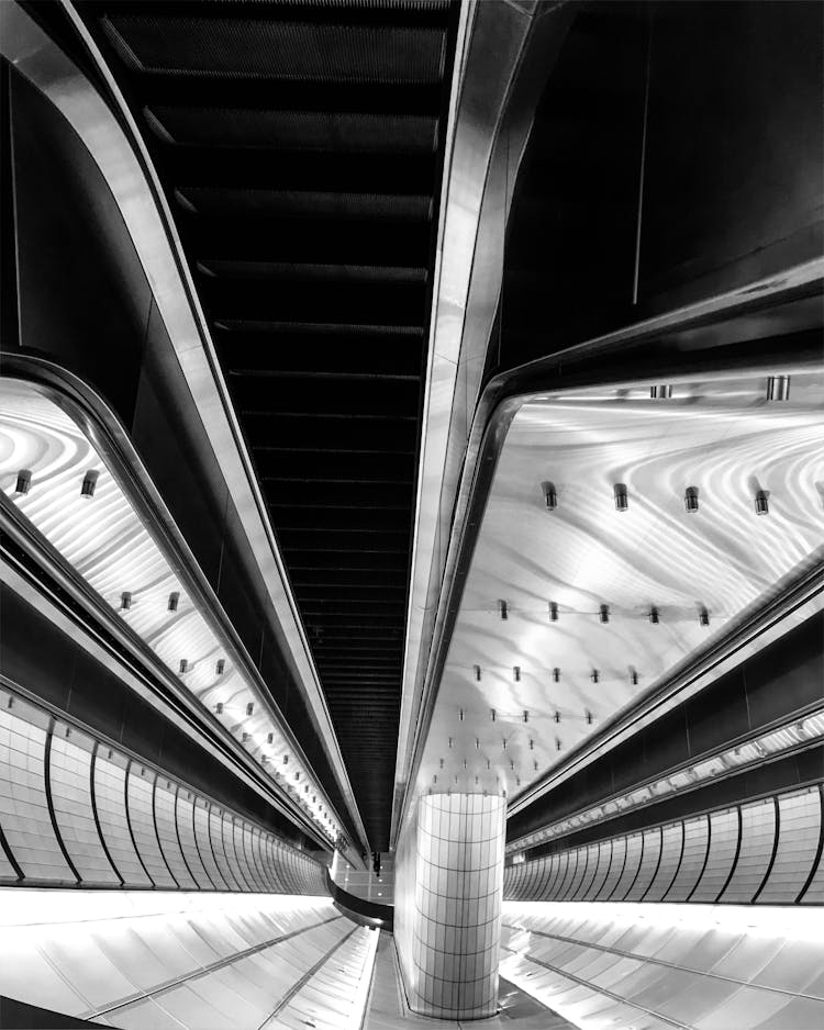 Upside Down Photo Of Escalator