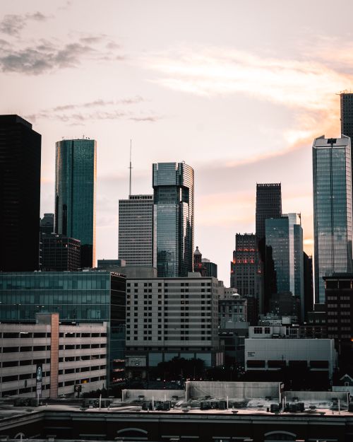 Free Captivating view of Houston's skyline at sunset, showcasing modern skyscrapers and urban architecture. Stock Photo