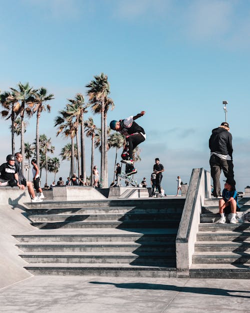 Skateboarder Doing Tricks on Stairs