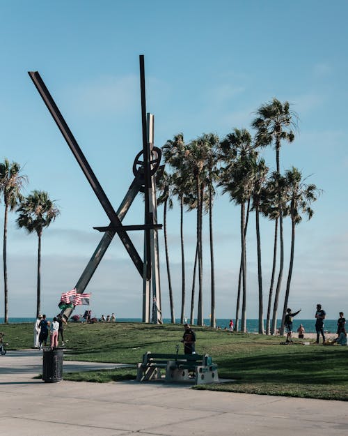 People Near the Declaration Sculpture at the Venice Beach