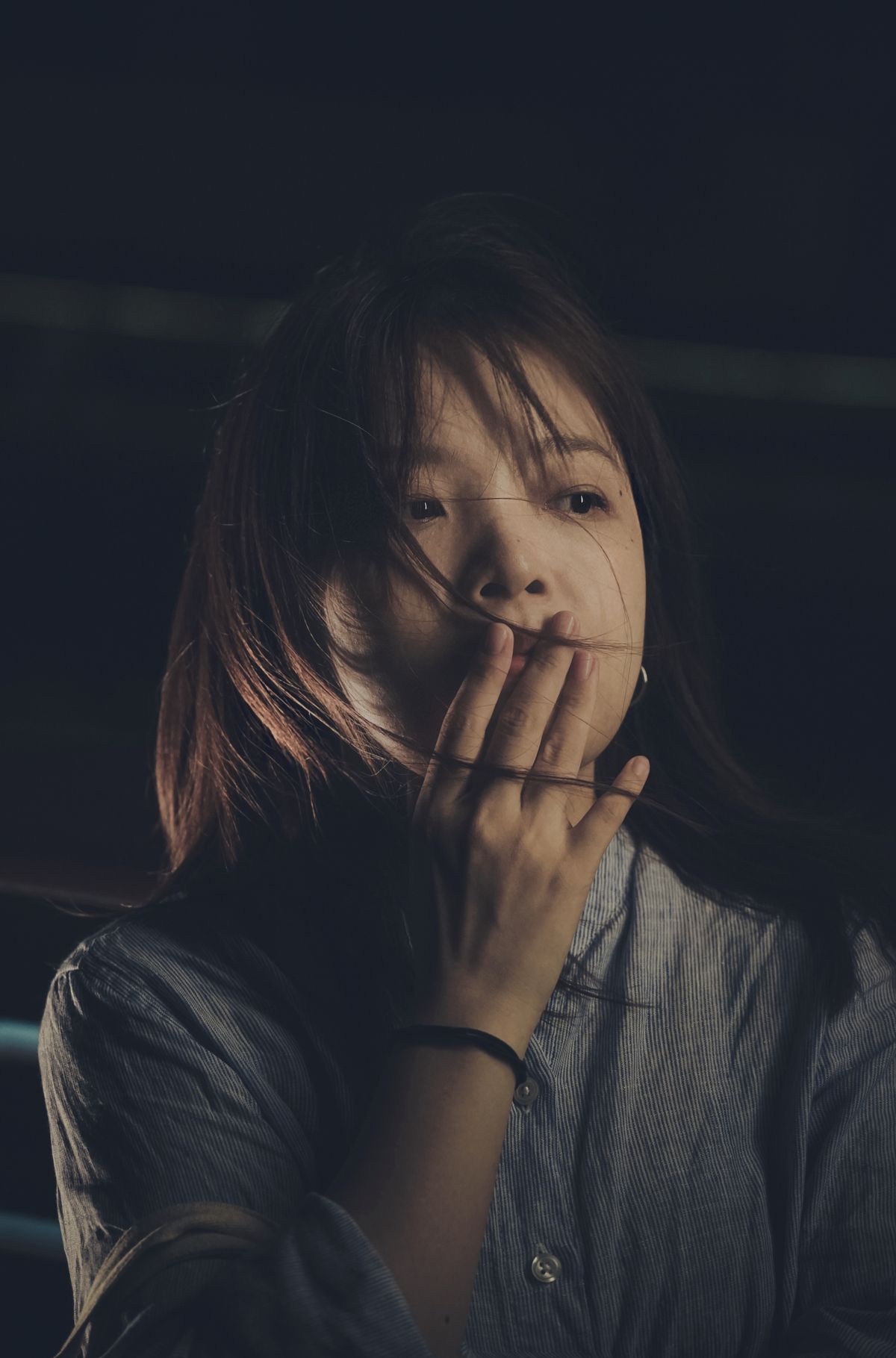 Chronic Bad Breath: Why It Keeps Coming Back — and How to Fix It at the Source 1 Woman covering her mouth with her hand, self-conscious about chronic bad breath that keeps coming back
