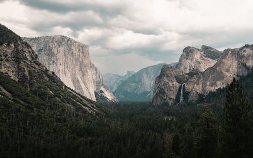 Photo of Mountains Under Cloudy Sky