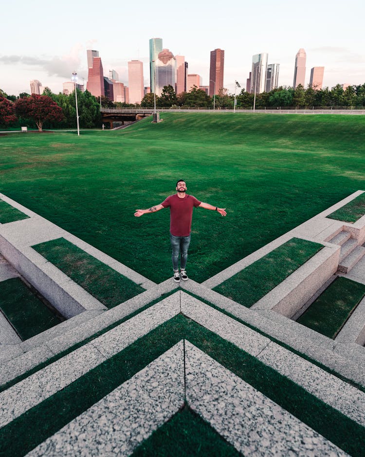 A Man Posing At The Houston Police Officer's Memorial