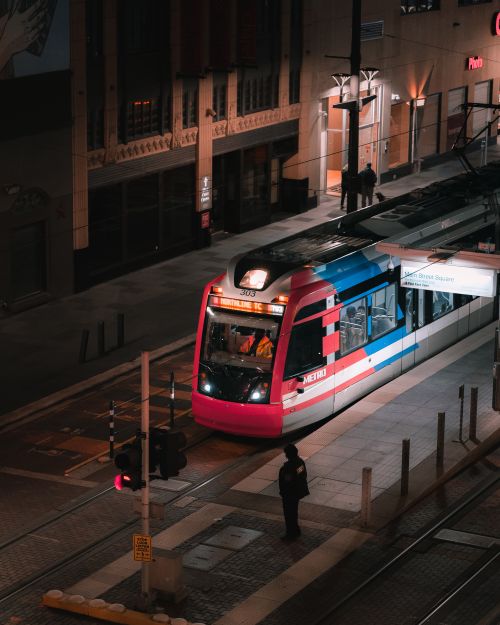 Free Tram in downtown Houston at night, vibrant urban transportation scene. Stock Photo
