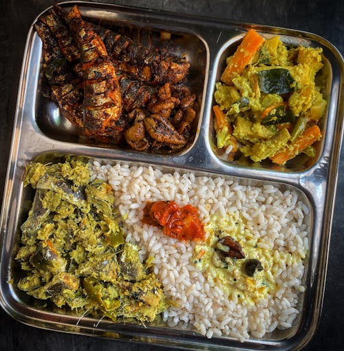 Traditional Food on a Stainless Plate
