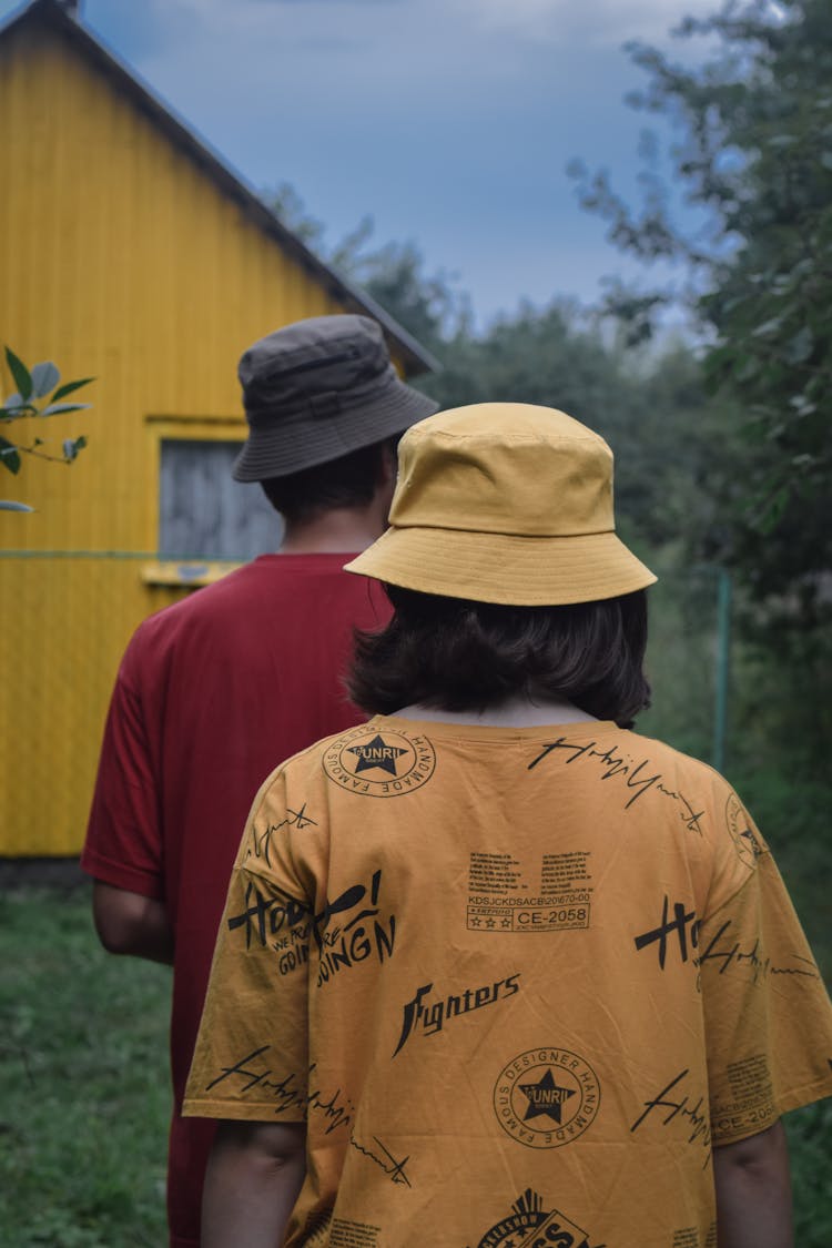 Two People Wearing Bucket Hats 