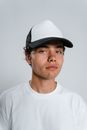 Man in White Crew Neck Shirt Wearing Black Cap
