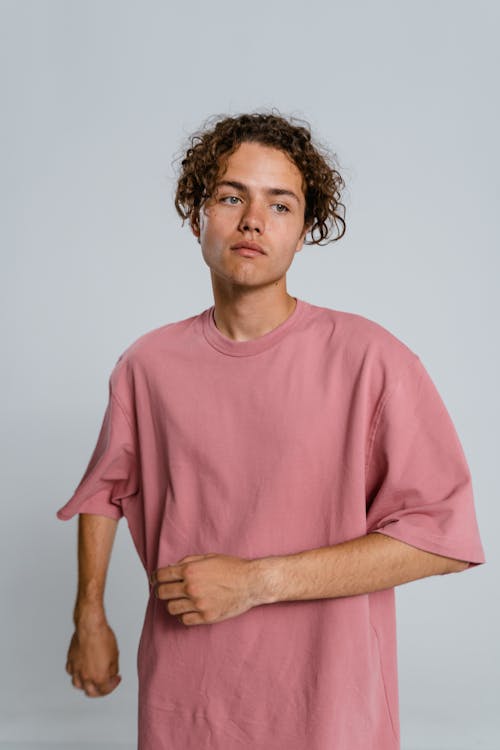 Man in Pink Crew Neck T-shirt