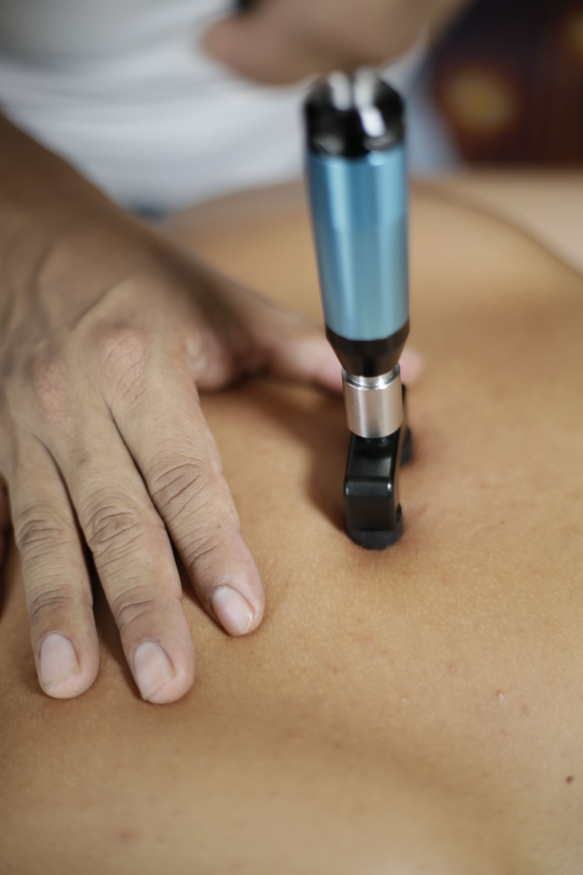 Close-up of a chiropractic adjustment therapy session