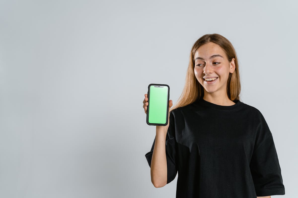 Man reviewing heart rate and activity data on a smartphone app