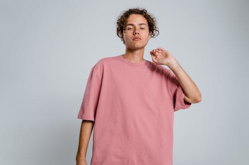 Free Man in Pink Crew Neck T-shirt Stock Photo
