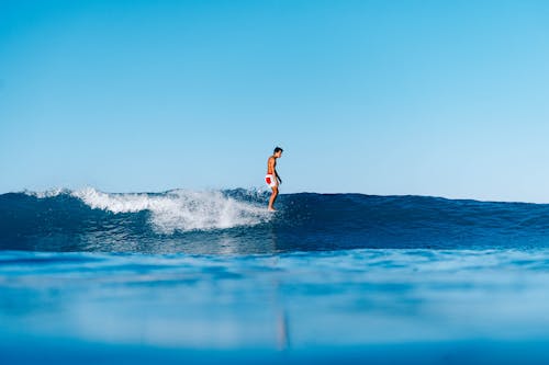 Gratis Immagine gratuita di acqua, cielo azzurro, fare surf Foto a disposizione