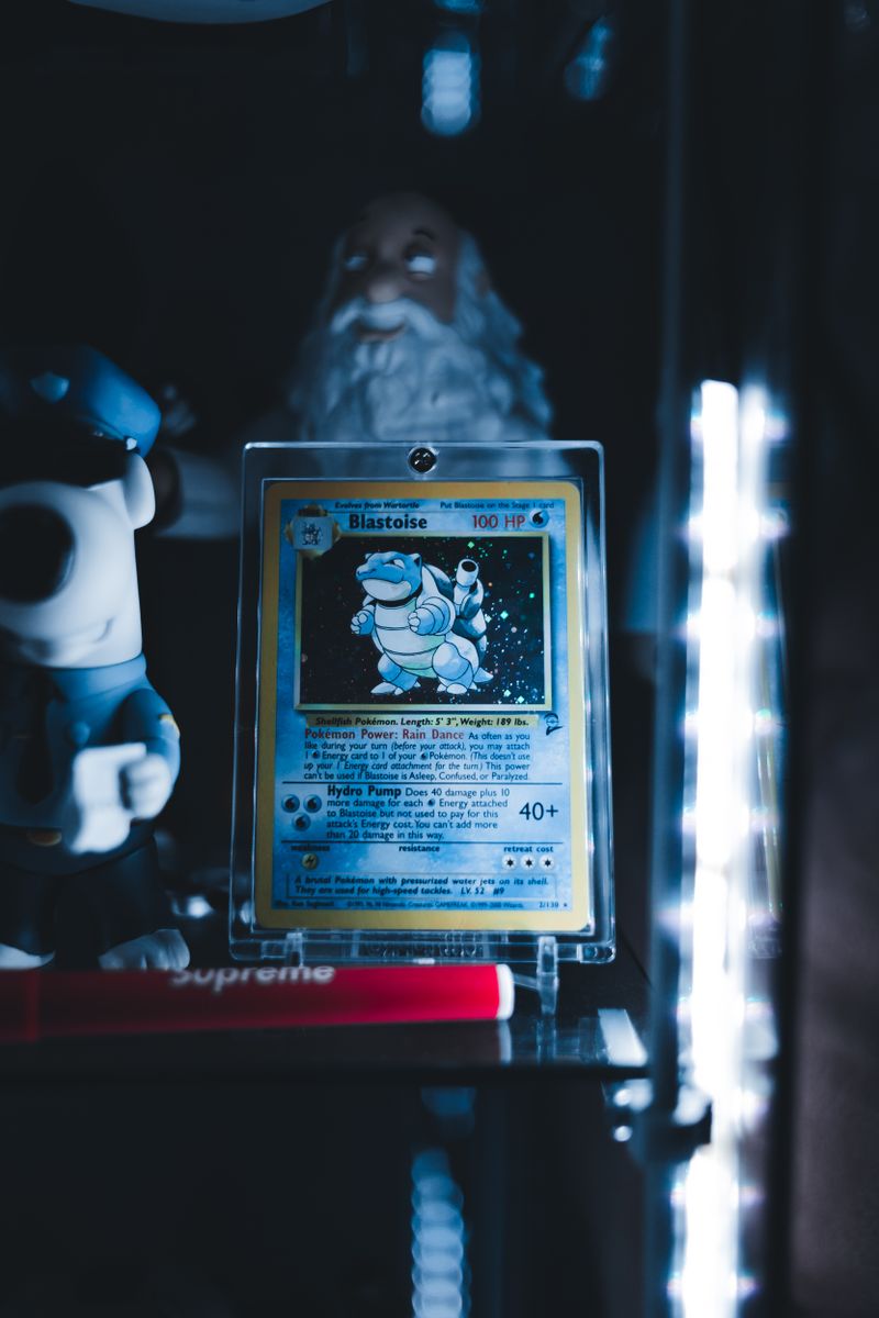 Blastoise Pokémon card in a protective case
