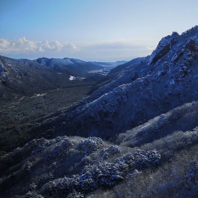Stunning winter view of snow-capped mountains in Seoraksan National Park, South Korea.