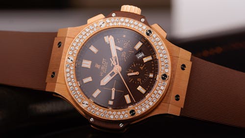 Free A Luxury Hublot Geneve Wristwatch with Diamond Studded Bezel  Stock Photo