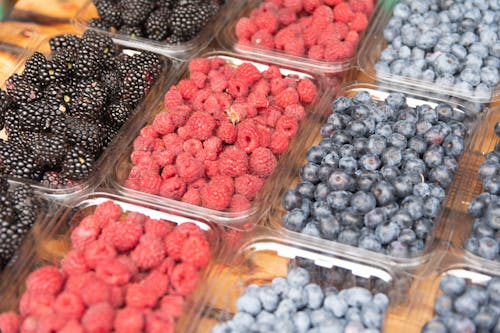 Free Assorted Berries In Plastic Containers Stock Photo