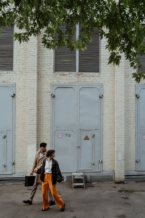 A Couple Walking on the Street