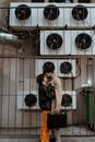 A Man and a Woman Flirting Outside a Building