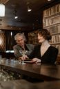 Man and Woman Sitting at the Table
