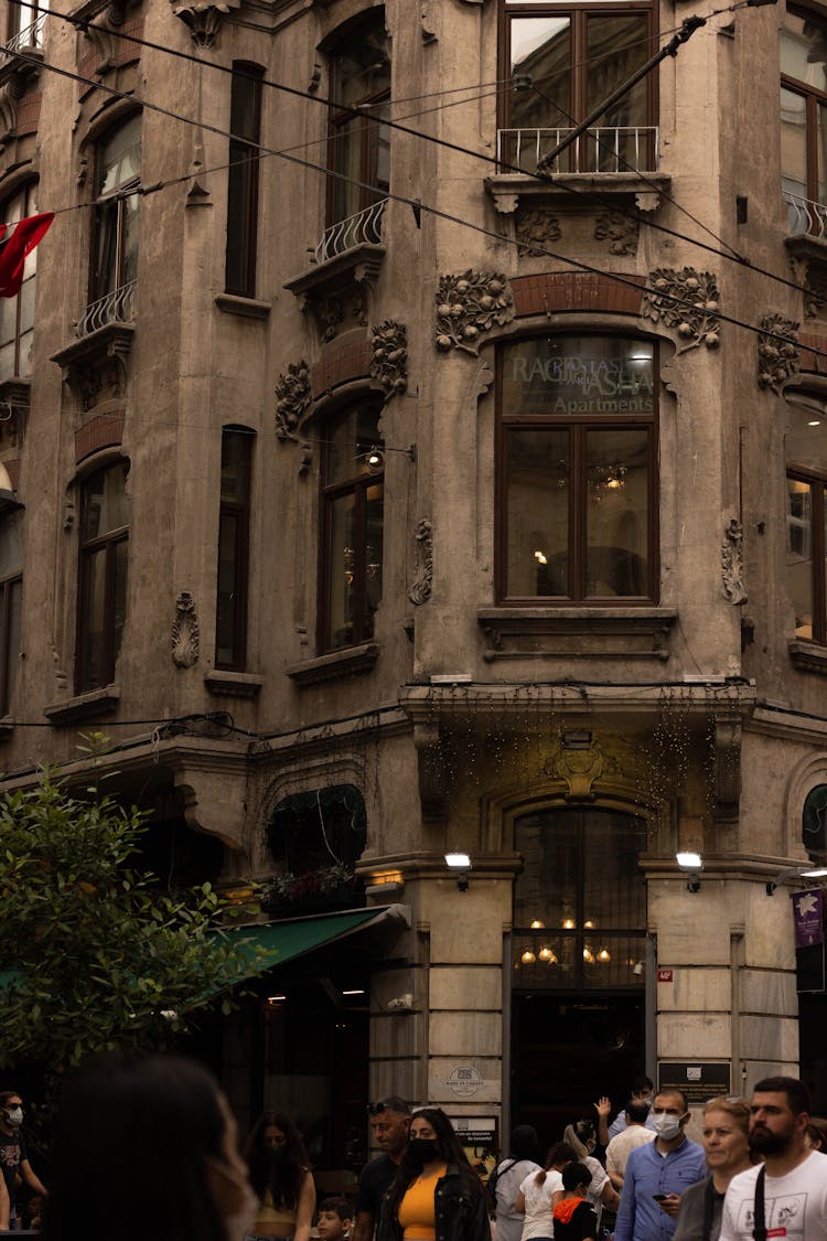 People Walking Outside Ragip Pasha Hotel