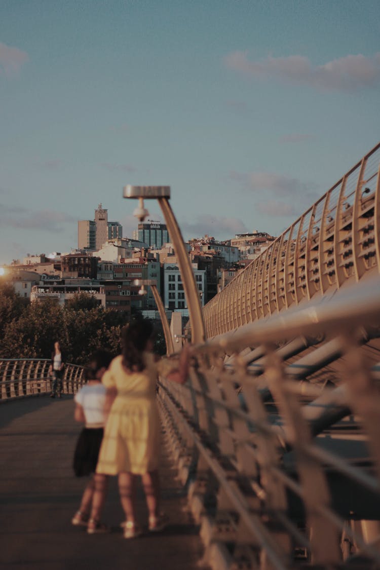 Kids Walking On The Bridge