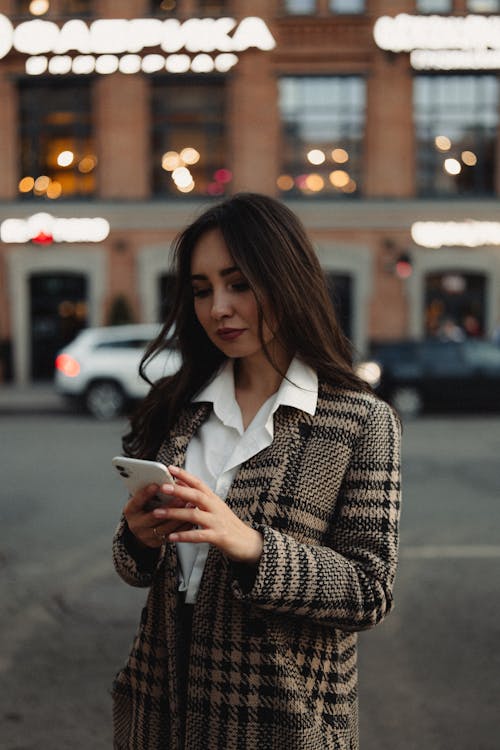 A Woman in Brown Coat