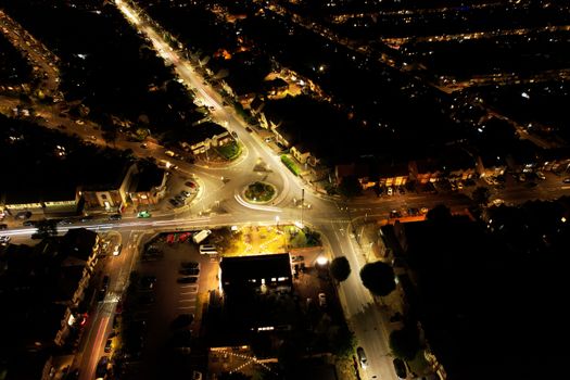 A stunning aerial night view of a bustling intersection in Luton, United Kingdom.