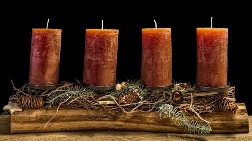 Free Four Brown Wax Candles Stock Photo