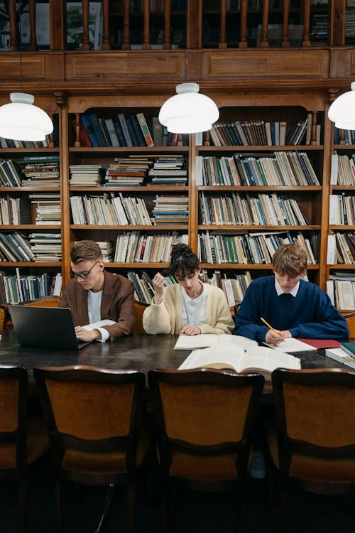 Free Students Sitting at the Table Stock Photo