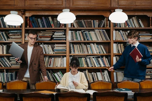 Free Students inside a Library Stock Photo