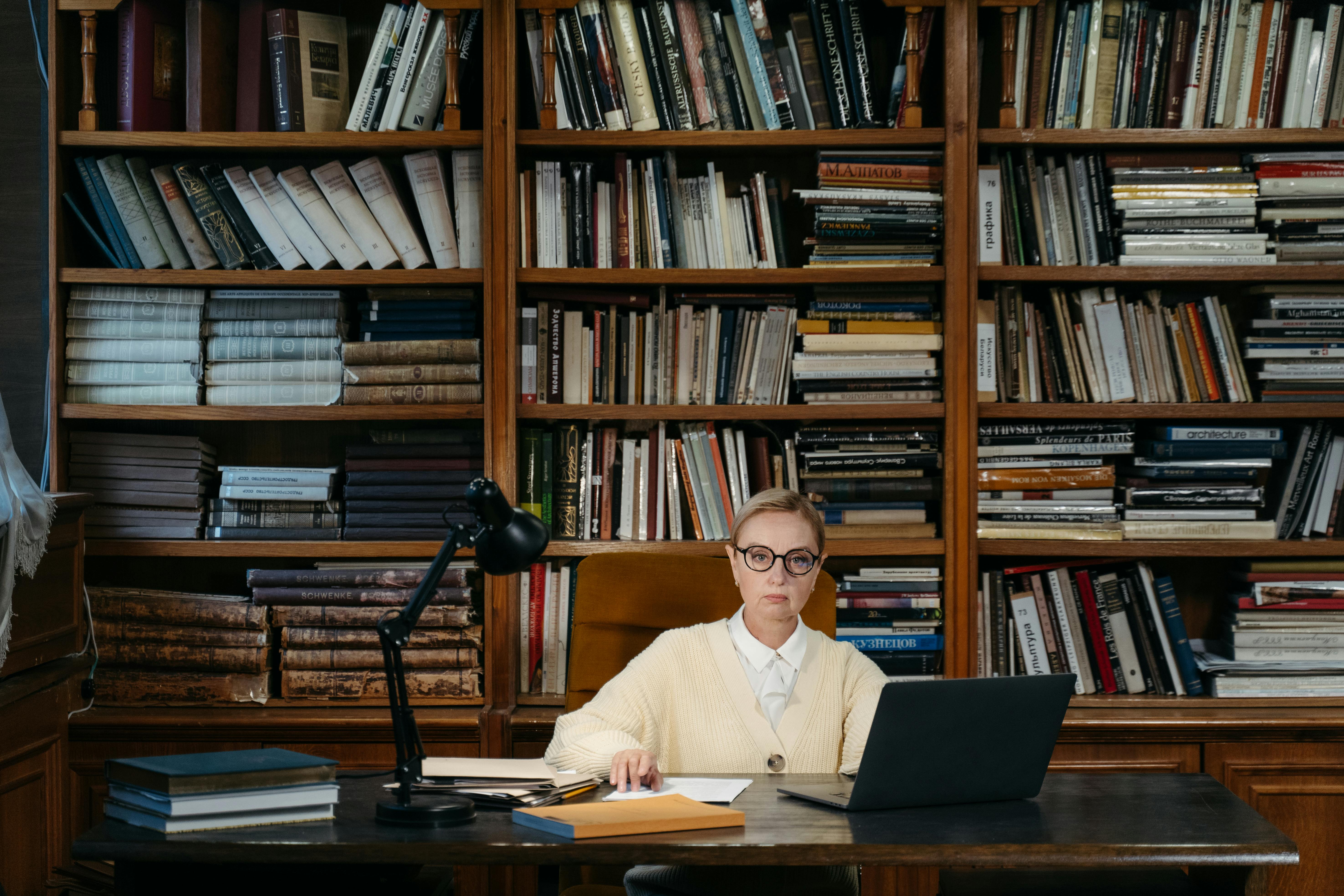 a woman sitting behind a desk