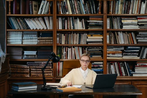 A Woman Sitting behind a Desk
