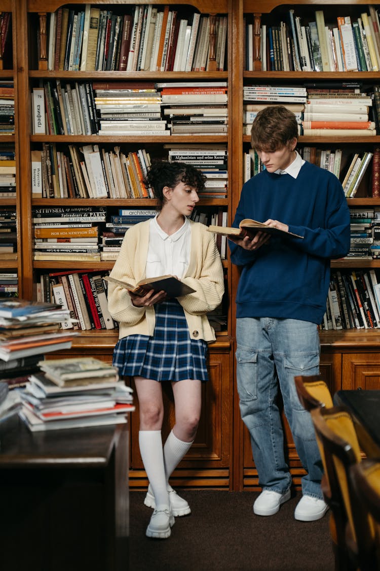 A Man And A Woman Reading Books Together