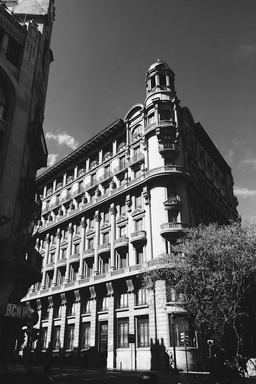 Grayscale Photo of Concrete Building