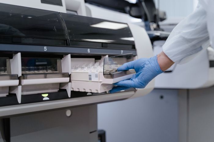 Lab technician using scientific equipment