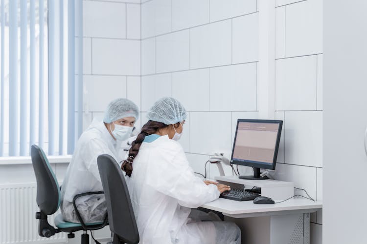 Scientists Working In A Lab