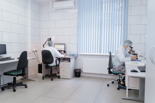 People Working Inside the Laboratory