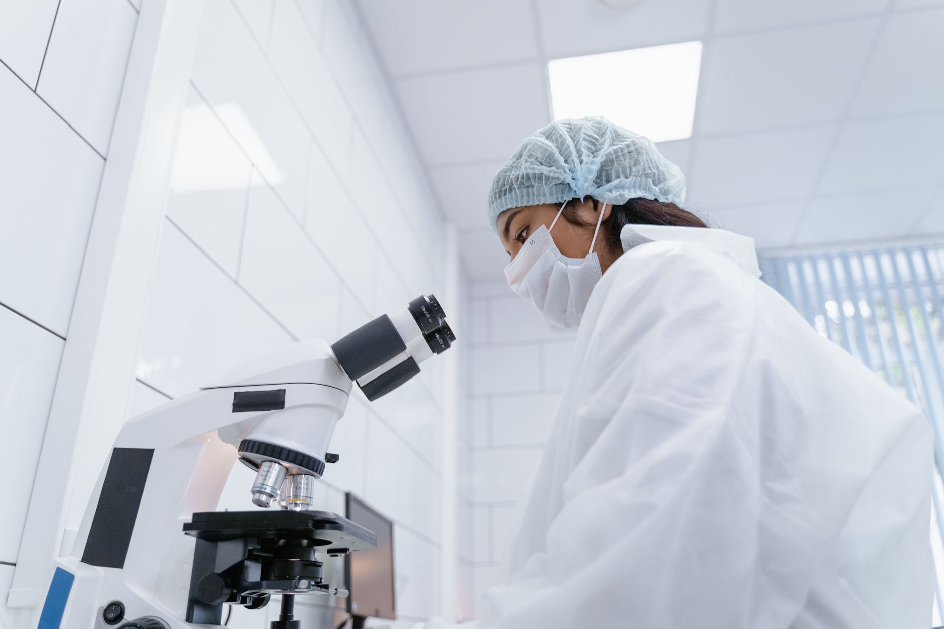 A scientist working in a laboratory with equipment